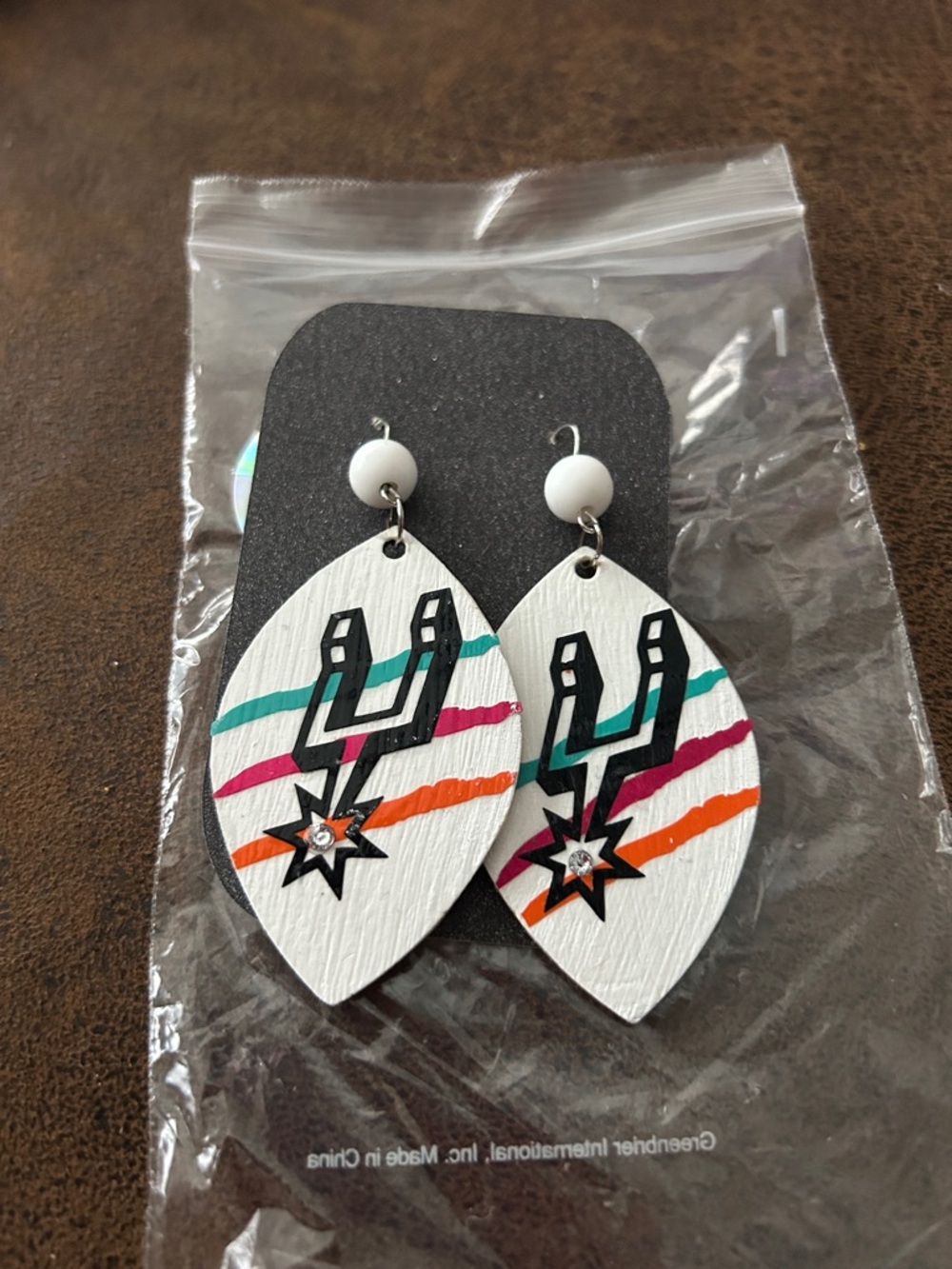 Spurs fashion earrings.
